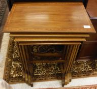 An Edwardian mahogany and satinwood banded quartetto nest of occasional tables on turned supports