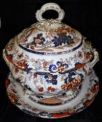 A Victorian Amherst China Imari pattern soup tureen with cover and stand, a sauce tureen and cover,