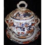 A Victorian Amherst China Imari pattern soup tureen with cover and stand, a sauce tureen and cover,