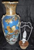 A pair of Meiji Period Japanese satsuma ware vases with ribbon and knot decorated side handles,