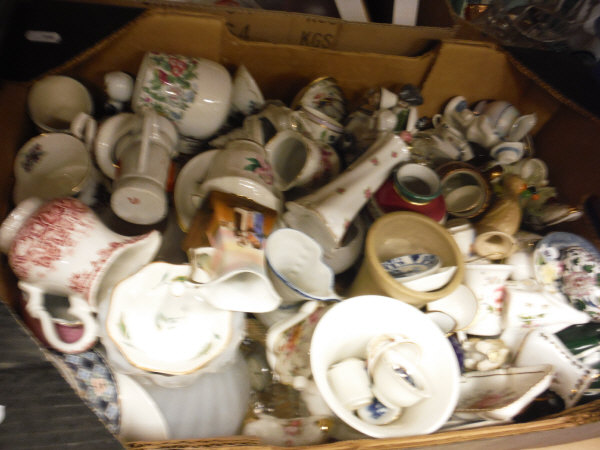 Seven boxes of assorted china and glass to include various vases, decorative plates, storage jars,