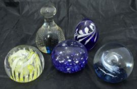 Assorted glass paperweights to include examples by Caithness "Moon Crystal",