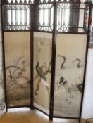 A circa 1900 mahogany framed three fold screen with glazed upper section and lower section set with