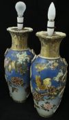 A pair of Meiji Period Japanese satsuma ware vases with ribbon and knot decorated side handles,