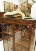 A 19th Century mahogany and inlaid glazed bookcase,