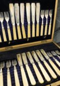 A set of twelve Victorian ivory-handled silver fish knives and forks (Sheffield 1897)