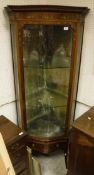 A 19th Century mahogany and satin wood banded and hand painted serpentine fronted corner display