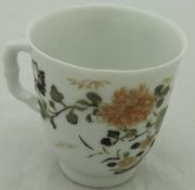 A Chinese export teacup with floral decoration CONDITION REPORTS Numnerous small