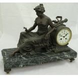 A 19th Century patinated spelter clock garniture, the movement by Destine & Herpin, Caen,