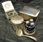 A collection of small silver and plated wares to include inkwells, dressing table jars,