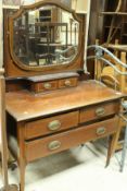 A Edwardian mahogany dressing chest with mirrored superstructure