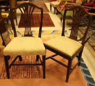 A set of five mahogany shield back dining chairs in the Hepplewhite taste,