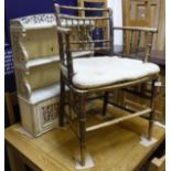A 19th Century Sussex style simulated bamboo framed elbow chair with rush seat together with a