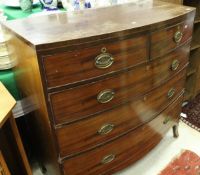 A 19th Century mahogany and inlaid bow front chest of drawers,