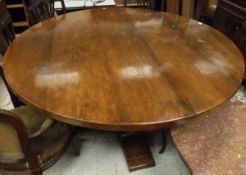 A modern cherrywood dining table,
