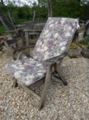 A Swan Hattersley teak garden table and six chairs with cushions