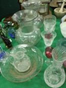 A 19th Century etched glass oval bowl with flower and vine decoration on a star cut base,