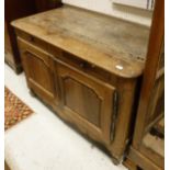 A 19th Century French walnut buffet with single frieze drawer and dummy drawer over two cupboard