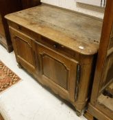 A 19th Century French walnut buffet with single frieze drawer and dummy drawer over two cupboard