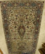 A Persian prayer rug, the central panel set with stylised Mirhab design,