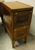 A circa 1900 oak two drawer filing cabinet