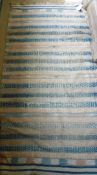 A Dhurrie Kelim rug of striped design in blue, cream and salmon pink,