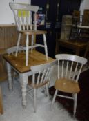 A set of four modern beech and painted kitchen chairs together with a pine and similarly painted