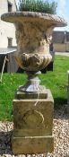 A Blashfield terracotta urn on plinth base CONDITION REPORTS Numerous areas of loss