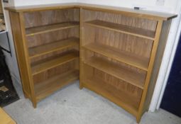 A pair of modern Oak Furniture land open bookcases
