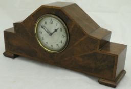 A walnut Art Deco mantle clock with Arabic numerals to the dial