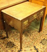 A 19th Century oak lowboy with later carved decoration in the Gothic Revival taste,