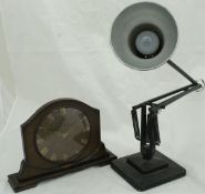A black anglepoise lamp by Herbert Terry of Redditch, raised on a stepped base,
