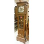 An early 20th Century oak cased long case clock of small proportions,