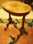 A Victorian walnut and inlaid sewing table,