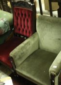 An Edwardian mahogany framed armchair in green velvet upholstery,