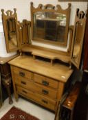 A Victorian satin walnut dressing chest with mirrored super structure over two short and two long