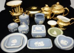 A collection of Wedgwood blue Jasperware to include pin dishes, trinket dishes, lidded vase, etc,
