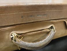 A Drew & Sons of Piccadilly Circus travel case with brass mounts and leather trimmed outer carrying