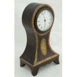 A circa 1900 mahogany banded and inlaid balloon shaped mantle clock with Roman numerals to the