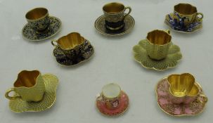 A collection of eight various miniature cabinet cups to include two Coalport,