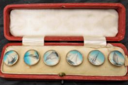 A set of six buttons with hand-painted decoration of sailing boats,