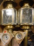 Two brass and glass carriage style wall lamps,