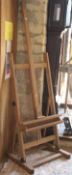 An artist's easel CONDITION REPORTS Max height approx 203 cm x max width approx 67