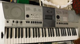 A Yamaha E413 keyboard and a Sony 5.
