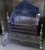 A wrought iron and brass fire basket in the Regency taste