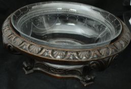 A 19th Century etched glass fruit bowl with swag design, on an associated hardwood stand,