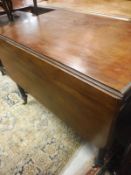 A 19th Century mahogany Pembroke table with single drawer,