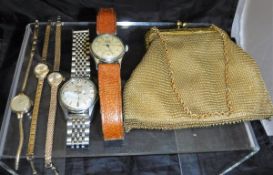 Three ladies watches with gold straps,