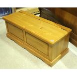 A modern pine blanket box,