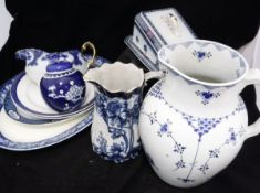 Four boxes of various blue and white china wares to include dinner wares, toilet set, jugs,